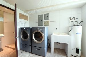 Cortijo Los Laureles luxury apartments for sale San José district Costa Rica laundry room